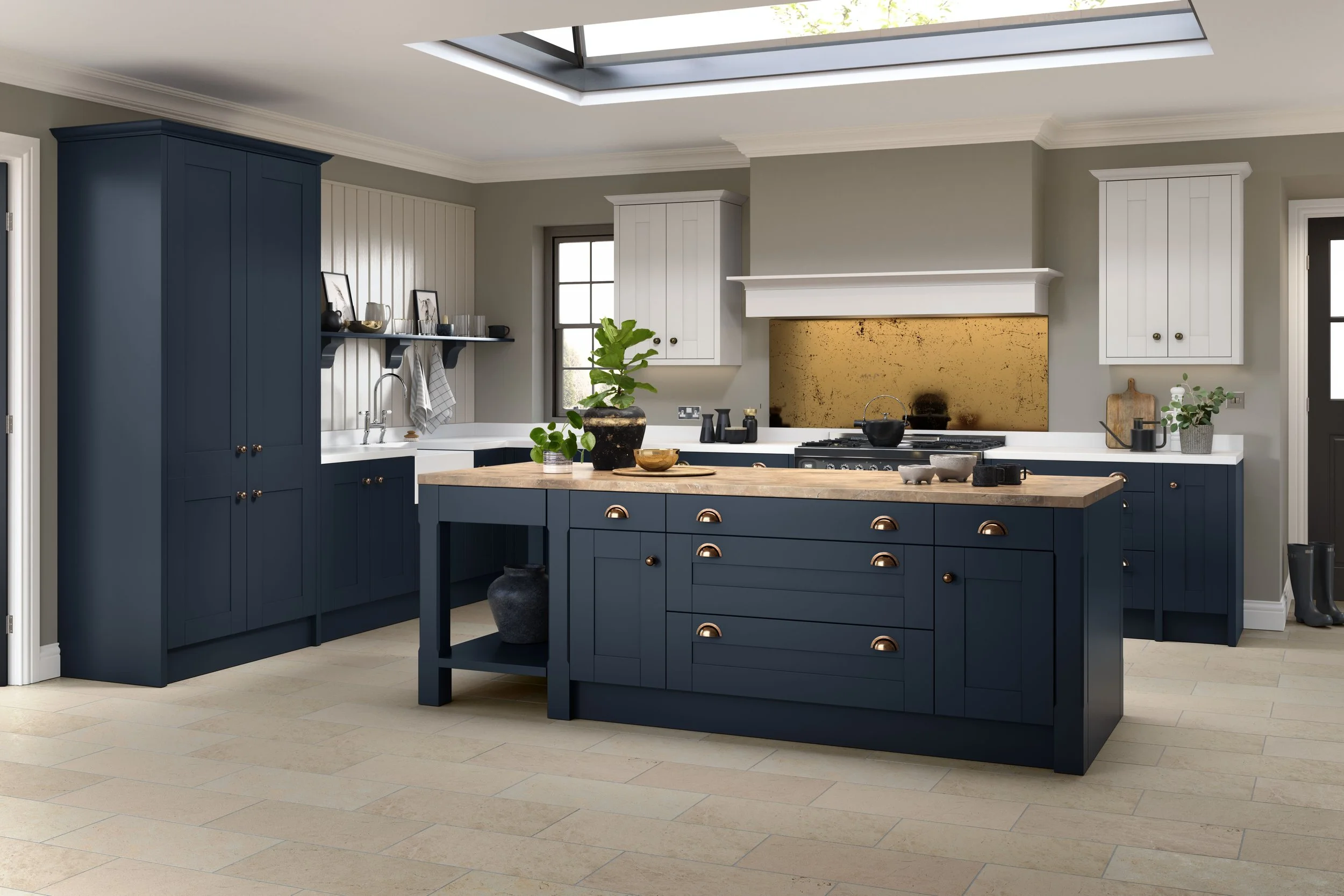 Omega Nouveau dual-tone shaker in indigo blue base cabinetry with limestone-painted wall units, brass cup pulls and a marble splashback; supplier image of a door style Oriel stocks